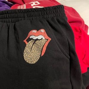 rolling stones cheetah print sweatpants logo
